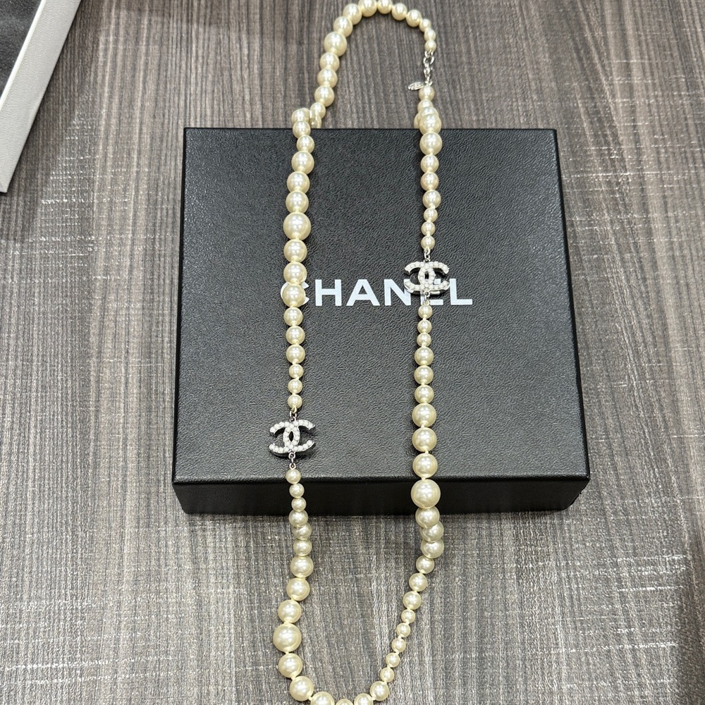 CHANEL Ivory Pearl Necklace with Silver Accents